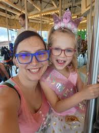 My daughter hears all the time how much she looks like Hannah Stuelke, so  she finally agreed to wear her hair in puff buns today for Athletes Vs  Farmers Day for homecoming." #