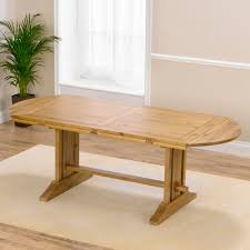 Julia ivory oak wood oval extension dining table with chunky 40mm brown top. Carver Solid Oak Oval Extending Dining Table