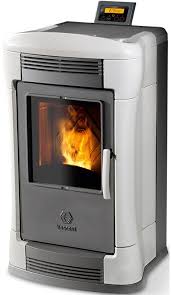 The Subtly Elegant Ambra Pellet Stove Carries A Clear Hint Of Modern Creativity With Its Striking Asymmetric Body Pellet Stove Wood Burning Heaters Wood Stove