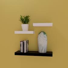 Shop for white floating shelves at crate and barrel. Three Floating Wall Decor Shelves Racks Black White