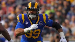 Aaron donald is a professional football player who is playing in the national football league(nfl) for the los angeles rams as a defensive tackle. Aaron Donald Is Nfl Defensive Player Of The Year Steelers T J Watt Second In Voting