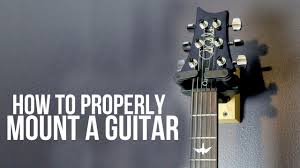 Instead, we would suggest investing in ceiling and floor brackets that you can install inside your home. How To Mount A Guitar To A Wall Youtube