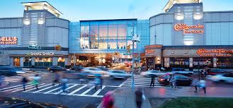 Located in the macy's wing next to victoria's secret. Macerich Properties Queens Center