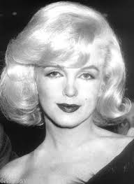 Does anyone know how I can achieve this 60's hair that Marilyn had in her  last year's? I cannot find any tutorial out there I have looked but the  ones I found