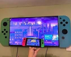 A global community of millions who come together each day. Nintendo Switch Tv Wall Mount Makes Your Tv Look Like A Etsy Wall Mounted Tv Outdoor Tv Cabinet Outdoor Tv