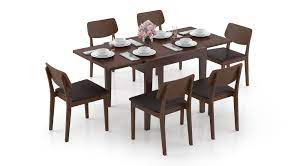 With two 15.75 open end extensions, the table can seat 8 or 10 people comfortably. Murphy 4 To 6 Extendable Lawson 6 Seater Dining Table Set Urban Ladder
