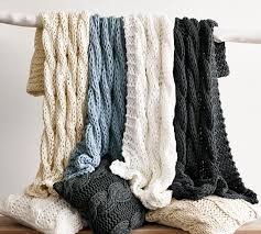 Knit baby booties are the cutest things! Colossal Handknit Pillow Covers Pottery Barn