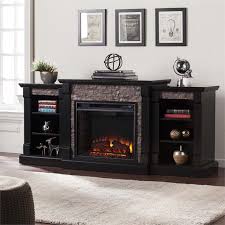 It is a white electric fireplace with faux stone in a traditional style with a coastal touch. Southern Enterprises Gallatin Faux Stone Electric Fireplace In Black Fe8525