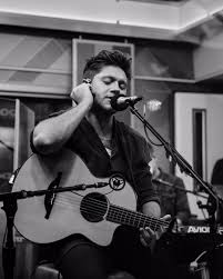 Image May Contain One Or More People People On Stage People Playing Musical Instruments Guitar And Indoor Niall Horan Naill Horan Niall Horan News