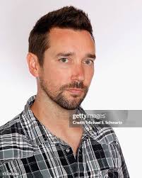 Comedian and Neurosugeon Max August poses during his attendance at... News  Photo