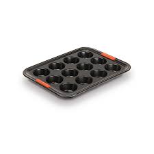 This round nordic fluted bundt style pan is made from cast iron and is preseasoned. Muffin Pan Le Creuset Official Site