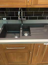 Build or buy preassembled units or modular adjustable ones or install you can buy bathroom shelves, of course. Composite Quartz Sink B Q B Q Kitchens Top Paint Colors Sink