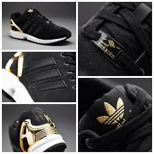 Black And Gold Adidas Sneakers Womens Adidas Originals Womens Zx Flux Core Black Core Black Gold Met قیمت ۵۵۱۰۰۰ تومان کد محصول ۱۰۳۱۴۸۰۲ Black Adidas Shoes Shoes Sneakers Adidas Gold Adidas