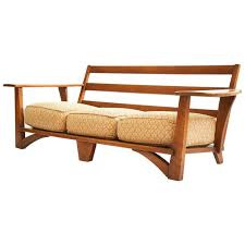 cushman paddle arm three seat sofa