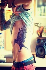 Rib cage tattoos for men. Top 40 Best Rib Tattoos For Men