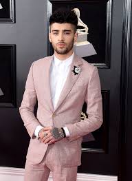 So, in the classic novel the great gatsby, there's a part when tom buchanan basically deride jay gatsby for wearing a pink suit, not because it's feminine, but because he said he was an oxford man and that. Zayn Wore A Pink Suit To The Grammys And I Now Can T Stand Up For Obvious Reasons Pink Suit Men Pink Suit Zayn Malik Style