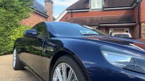 Image result for Midnight Blue 2011 Aston Martin