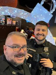 EGPD members SRO Ashley, Ofc. Boniface & Det. Hotaling were thrilled to  attend #ShopWithaCop sponsored by Country 107.7 WGNA FM & Blue Friday New  York today.