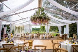 Create a curtain of flowers by stringing your favorite flowers and hanging them from the ceiling. Hanging Installations A Garden Party