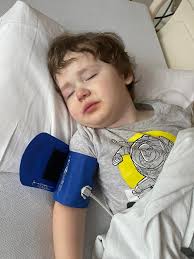 Pua helps with IV placement for scout