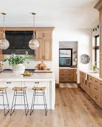 Today's take on modern farmhouse decorating is rooted in rustic country charm peppered with warm minimalism and industrial elements somewhat similar to scandinavian interior design. The Top 70 Best Modern Farmhouse Kitchen Ideas Interior Home And Design