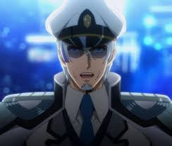 Creator Shoji Kawamori (wearing blue in the backrow) and the cast and crew  of Macross.