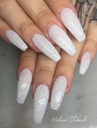 Crisp white nails are a classic choice — a simple white polish manicure can be an effortlessly chic look, adding a touch of sophistication to your style. Birthday Boujee Shit Sparkly Acrylic Nails White Glitter Nails Square Acrylic Nails