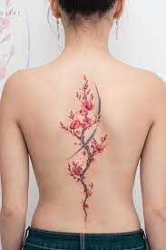 The most common locations for cherry blossom tattoos are sleeve, full sleeve, upper back, lower back hip, rib cage or side area, and shoulders. Tender Selection Of Cherry Blossom Tattoo For Your Inspiration Blossom Tattoo Watercolor Tattoo Tree Floral Back Tattoos