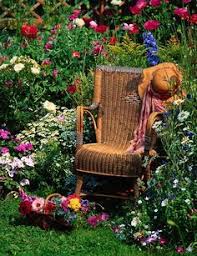 Beautiful garden scene with blooming cherry tree on the blue garden chairs. 160 Garden Chairs Ideas Garden Chairs Garden Outdoor Gardens
