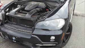 I have taken a picture of the trunk with the gray cover removed. Bmw X5 Battery Location Hidden Youtube