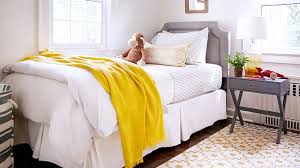 If your bedroom is decorated in cooler pastel tints of green, blue, purple, or gray, you'll achieve the same effect with black. Yellow Blue Grey Bedroom The Red Fairy Project
