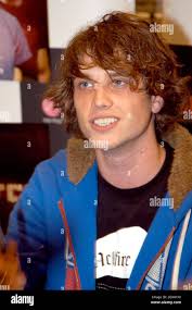Nick Atkinson of pop rockers Rooster at an instore signing and live  performance at HMV, Manchester Stock Photo