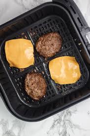 Place fresh made, store bought or frozen (following the make ahead instructions below) turkey burgers in the air fryer basket, making sure to leave space around them. Air Fryer Frozen Burgers The Dinner Bite