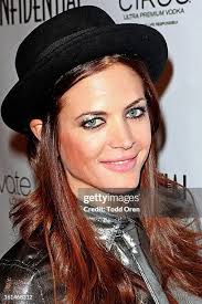 John Duah and Denise Valbuena attend Los Angeles Confidential... News Photo 