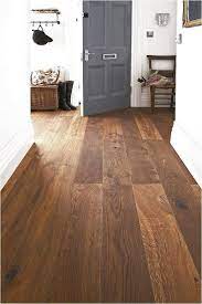 Ik Ben Gek Op Houten Vloeren Met Een Houten Vloer In Huis Oogt Je Interieur Veel Warmer Meubel Floori Wooden Front Doors Flooring Living Room Design Diy