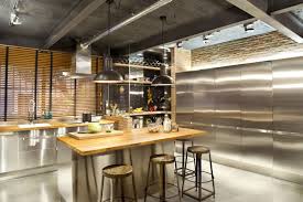 Stainless steel cookware is a popular choice in professional kitchens. Kitchen Breakfast Bar Island Stainless Steel Units Loft Style Home In Terrassa Spain Fresh Palace