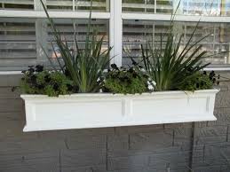 Exercise your green thumb with window boxes, hanging baskets or railing planters around the house. Window Sill Planter Box Window Sill Planter Box Window Sill Planter Planter Boxes