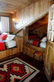 This cabin gets a large dose of warmth and style from its floors and walls, which are clad in reclaimed wood of varying tones. Small Cabin Decorating Ideas Awesome 460 Best Lodge Style Bedrooms Images On Pinterest Lodge Style Bedroom Cabin Bedroom Decor Cabin Bedroom