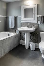 Omaha Toto Promenade Pedestal Sink Bathroom Contemporary With Industrial Nickel Vanity Lights Towel Bar Please describe the assembly in the tank.