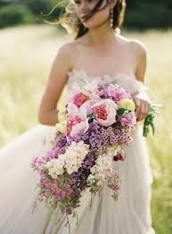 These sweeping streams of blooms add drama and 1. Trend Alert Cascading Bouquets Socialandpersonalweddings Ie