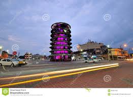 The reasons why the tower leans is the soft ground on which it was built, as well as the weight of the water in the water tank, which causes it to lean towards the southwest. Leaning Tower Of Teluk Intan At Night Stock Photo 65057432 Megapixl