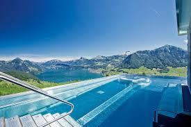 Infinity Pools Blick In Die Weite Des Horizonts Schwimmbad De In 2020 Schweiz Hotels Villa Ferienanlagen