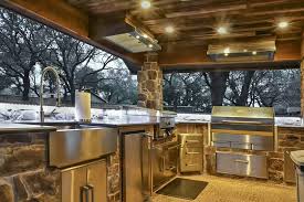 a rustic outdoor kitchen addition