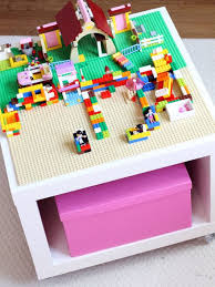 Stick Velcro Strips To The Back Of Lego Boards To Make An Awesome Lego Table Ikea Toy Storage Lego Table Diy Ikea Toys