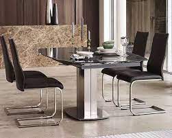 Bar and pub tables are the perfect dining sets for smaller spaces if you live alone or only need space for two. Flow Swivel Extending Dining Table Chairs