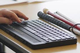 Can you imagine reading harry potter one line at a time? Humanware Mantis Q40 Braille Braille Display Bluetooth Keyboard Blindness Humanware Low Vision Blindness Solutions
