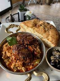The illustrated logo for the baklava lady. The Baklava Lady English Town New Jersey Restaurant Happycow