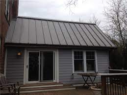 Tactile stone coated steel roofing tiles. Black Metal Roof Silver Spring Md Black Metal Roof Metal Roof Home Exterior Makeover
