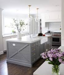 White kitchen navy island 27. 15 Gorgeous White Kitchens With Coloured Islands The Happy Housie