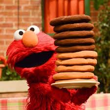 Monsters ate cookies and appeared in a general foods commercial . Elmo On Instagram Yeah Baby Does Elmo Have A Great Surprise For Cookie Monster Or What Nationalchocolatechipcookieday
